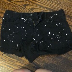 Black Heart white paint splatter jean shorts